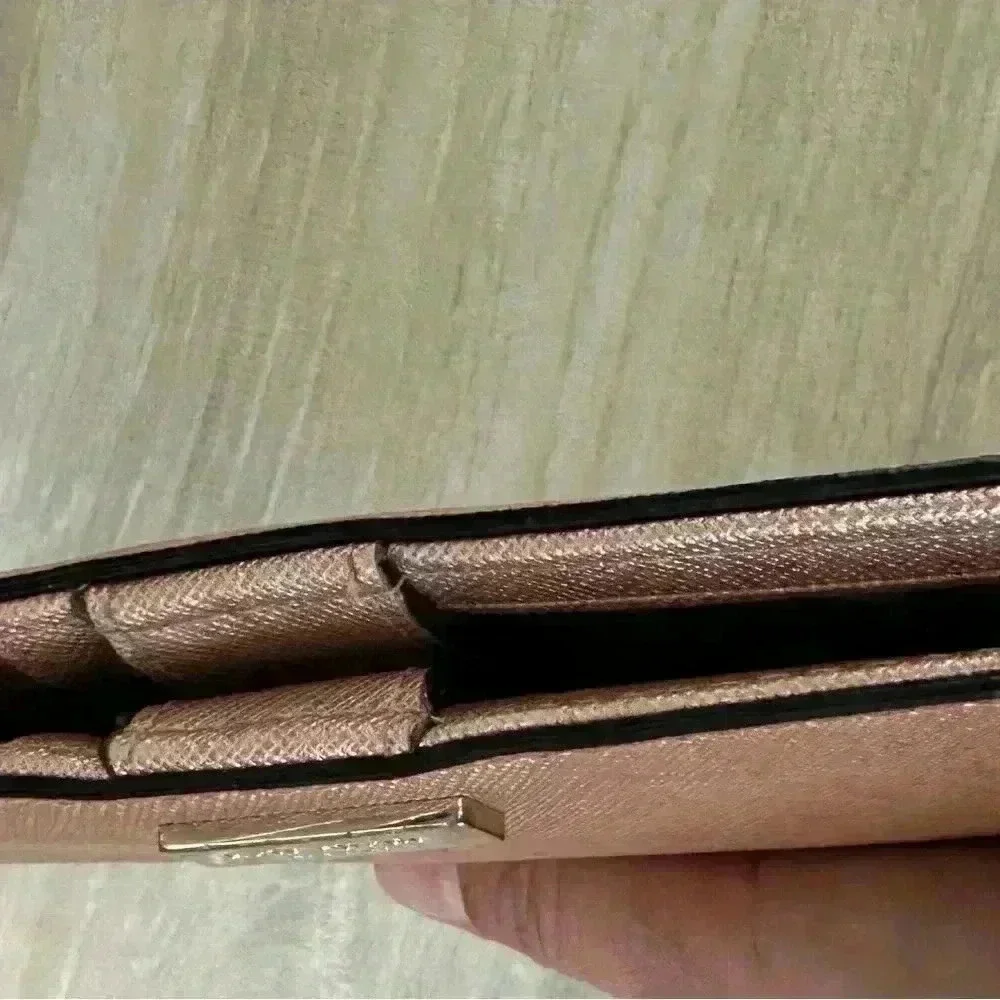 Kate Spade Rose gold wallet
